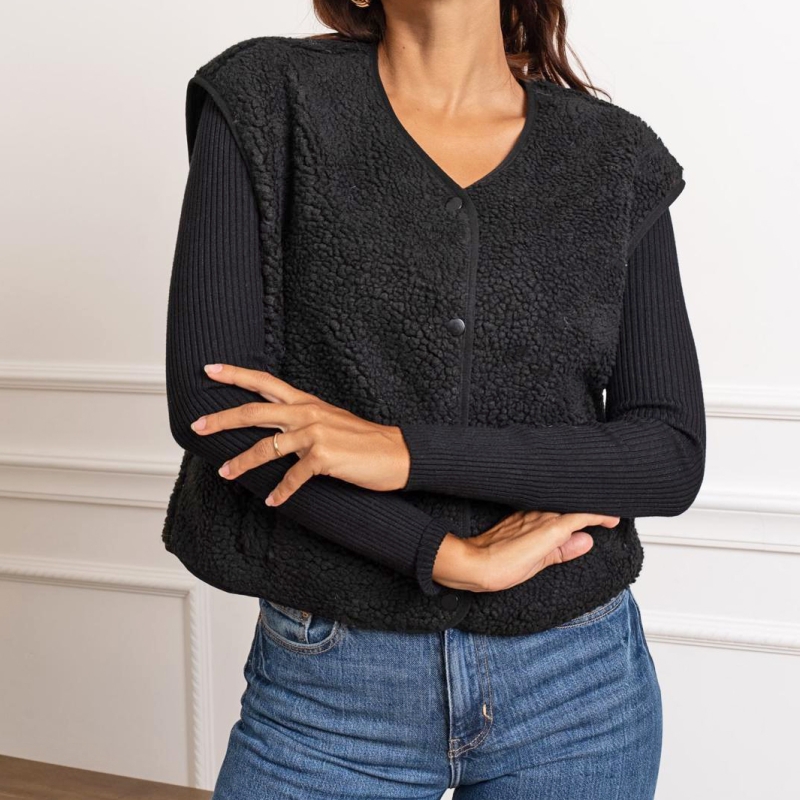 Détail pressions veste noire