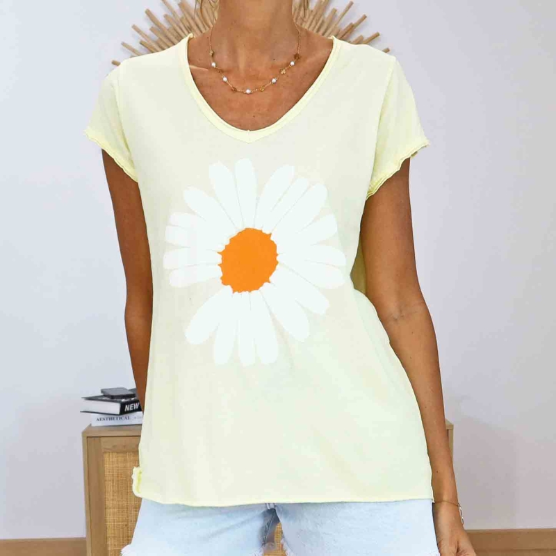 T-shirt jaune femme avec grosse marguerite blanche et orange