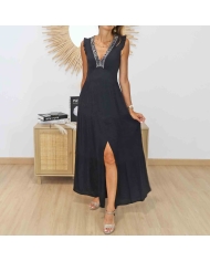 Robe noire élégante avec perles et sequins argentés